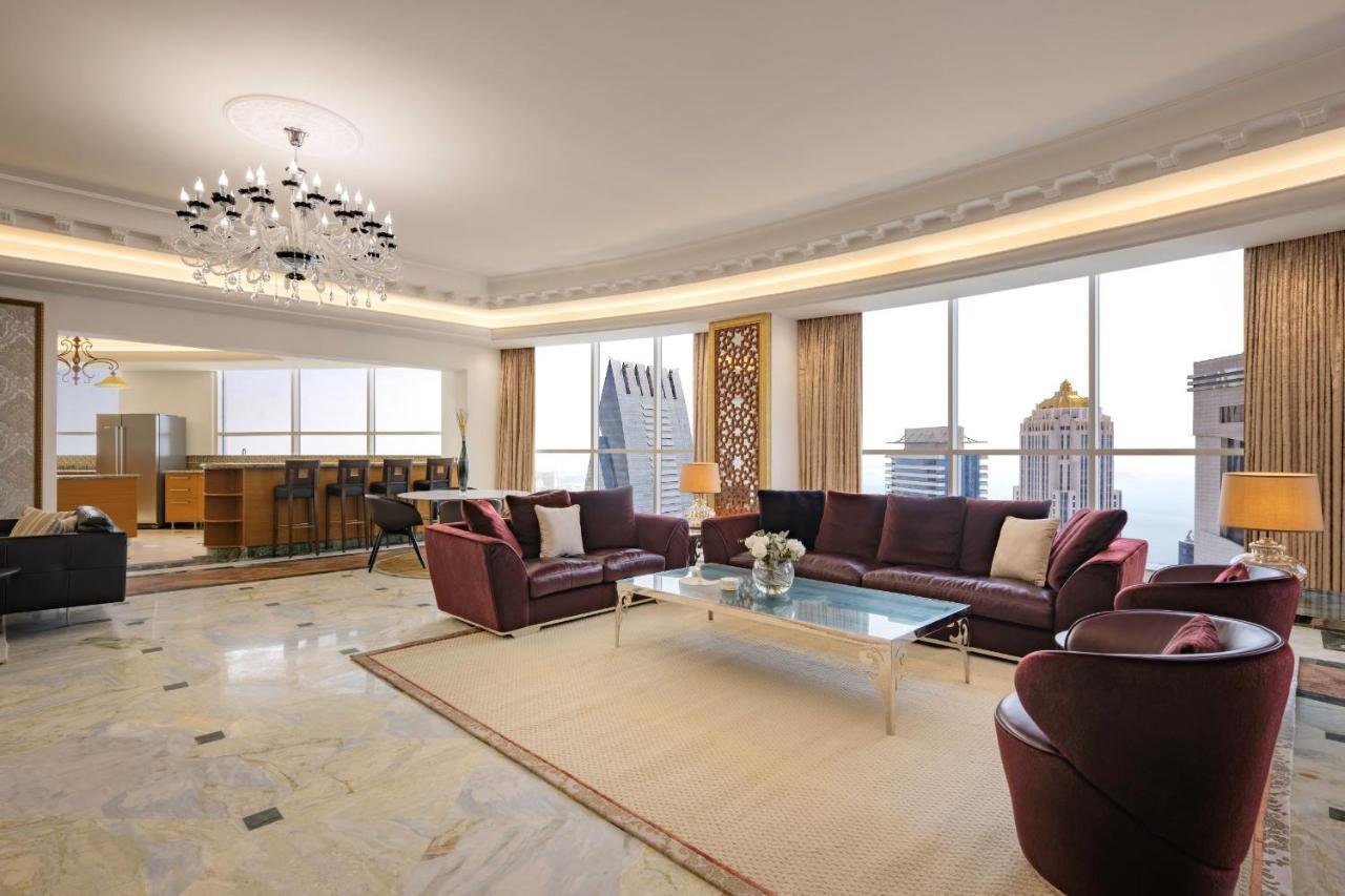 Dusit Hotel & Suites - Doha Bagian luar foto A living room in a luxury apartment