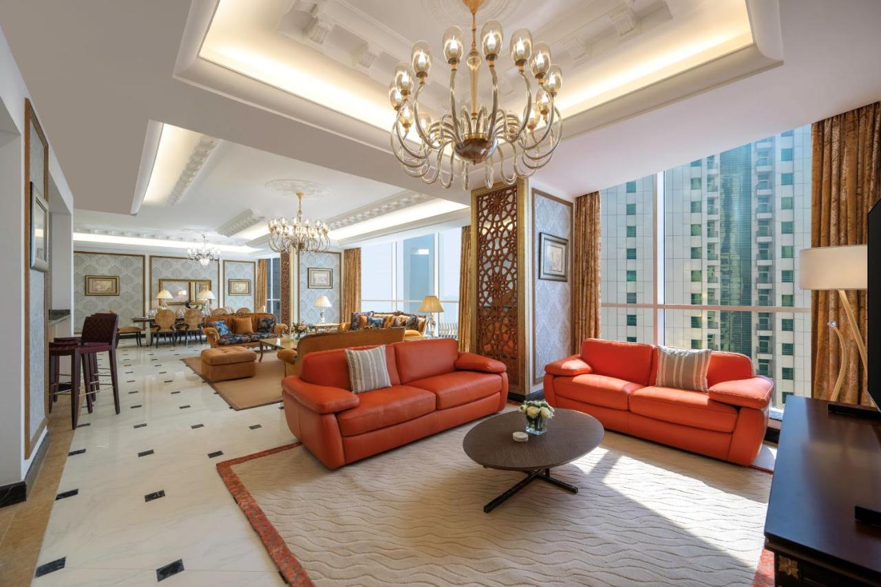 Dusit Hotel & Suites - Doha Bagian luar foto The living room of a suite at the Shangri-La Kuala Lumpur
