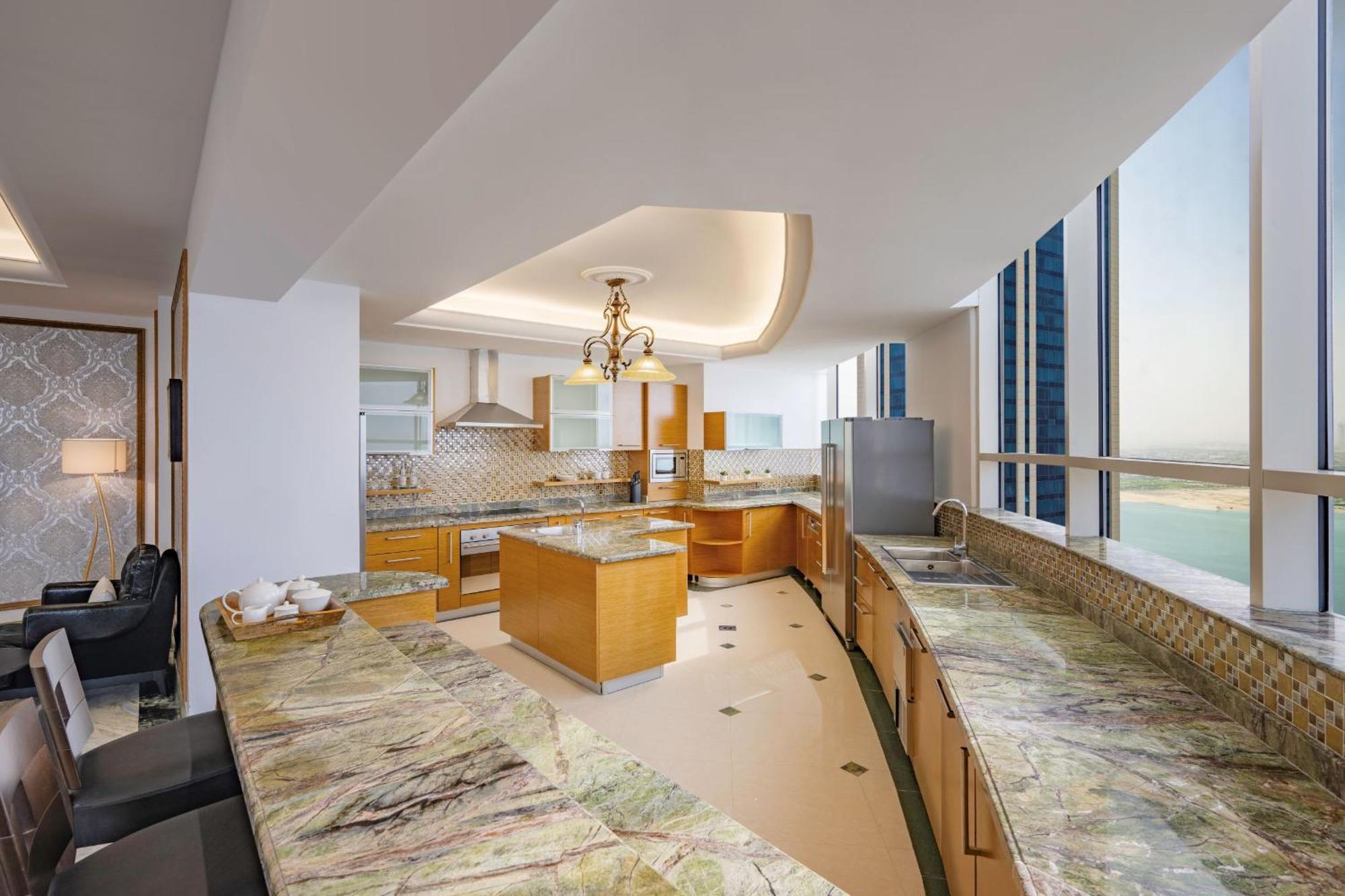 Dusit Hotel & Suites - Doha Bagian luar foto A kitchen in a penthouse
